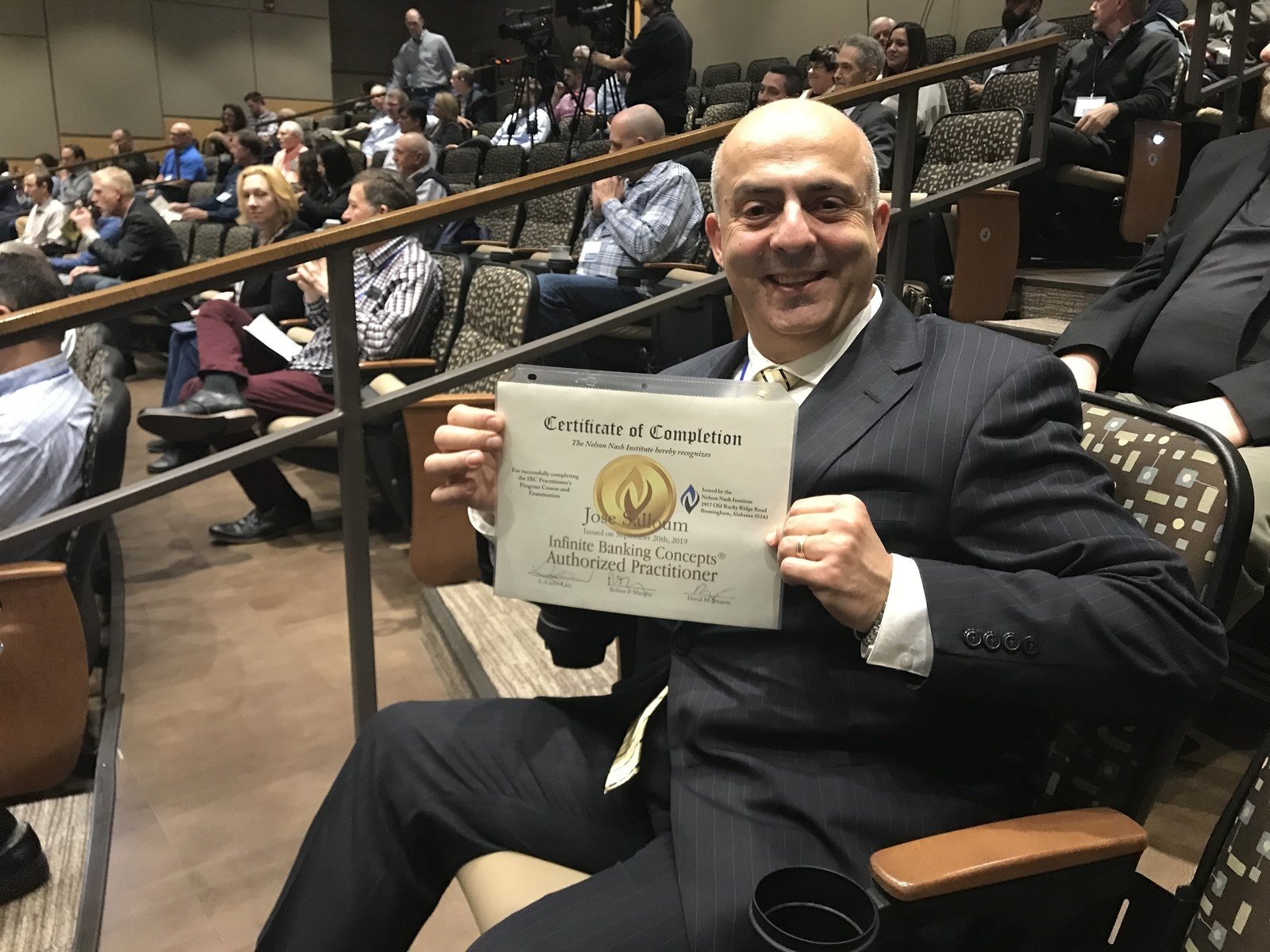 Jose Salloum holding his Nelson Nash Institute certificate of completion for the IBC Practitioner's Program course and examination, issued 20 September 2019.